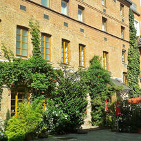 The sunny inner courtyard of Hotel Fabrik